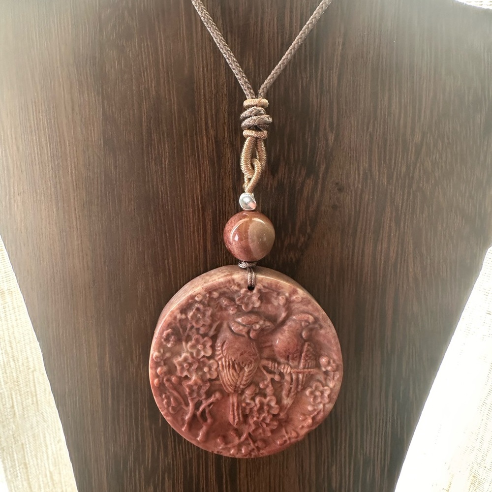 Coral Fossil Carved Round Bird Pendant Necklace on Tan Adjustable Rope - Picture 9 of 13